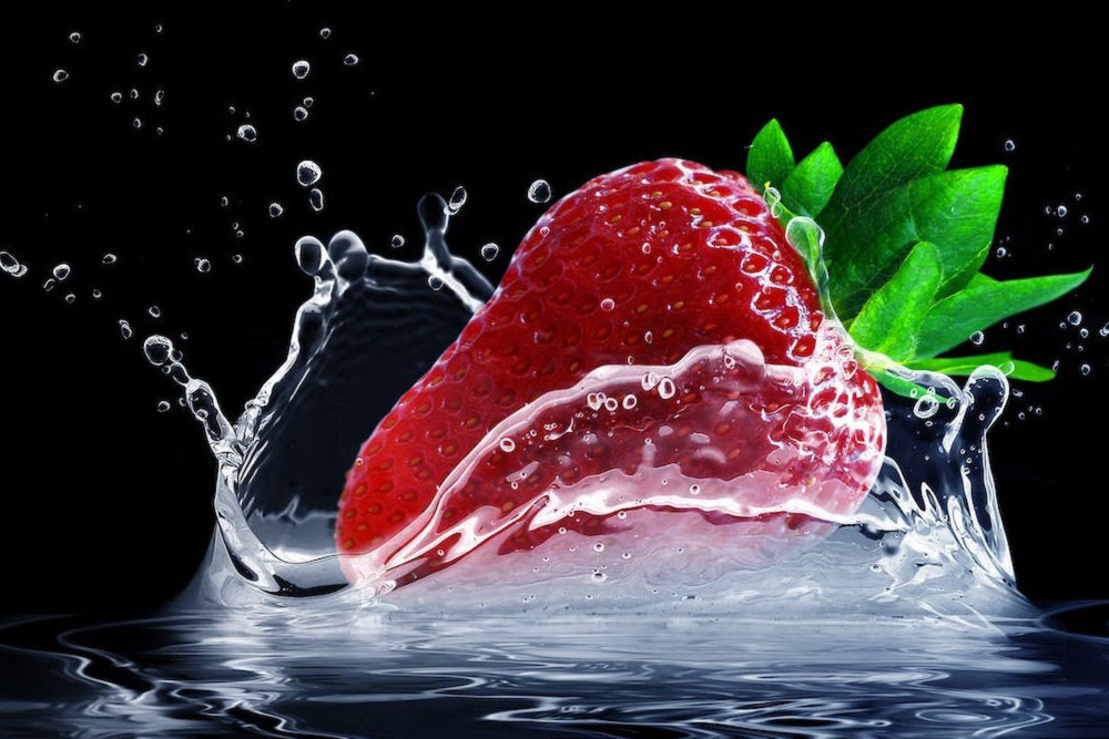 A Strawberry Falls into the Water