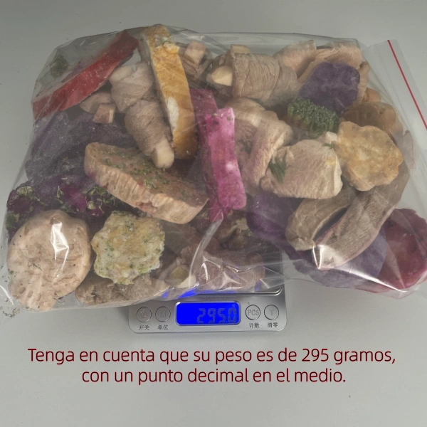 A large bulk bag of assorted freeze-dried pet treats weighing only 295 grams on a digital scale, proving the extreme weight reduction achieved by professional freeze-drying equipment.