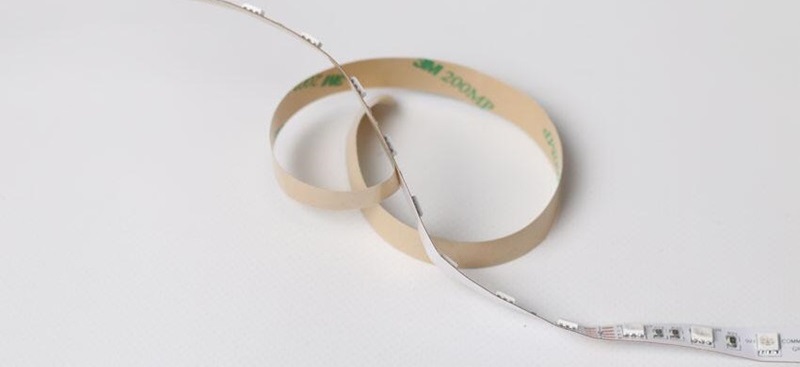 Peel off the adhesive backing from the LED strip lights