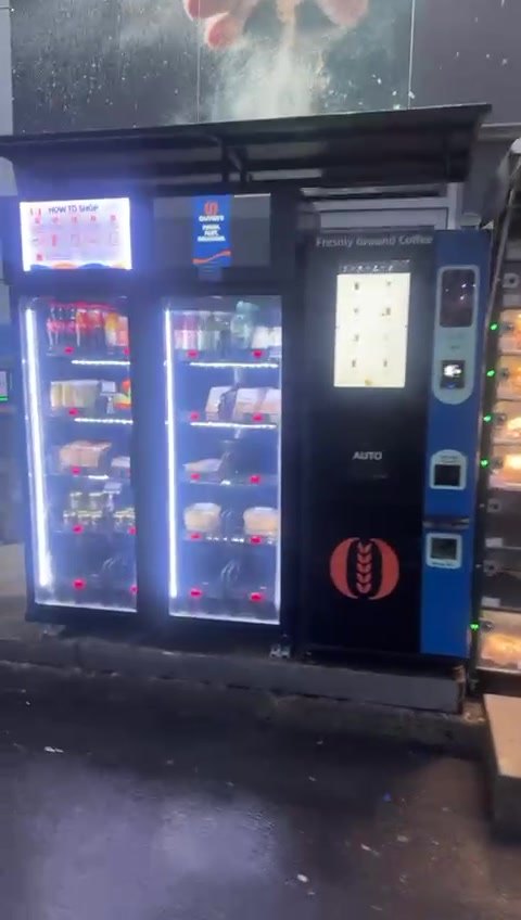 WEIMI double door gravity cabinet with illuminated food and drink shelves beside a coffee machine at a customer installation in Ireland
