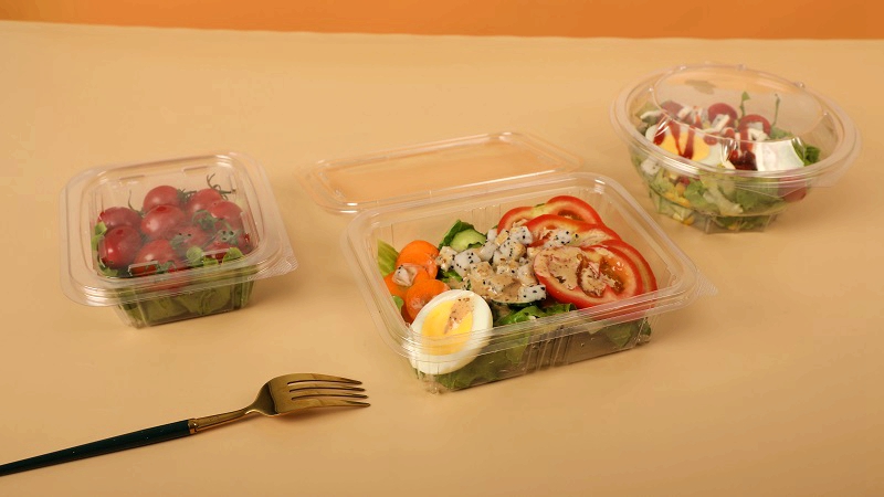 clear hinged lid container on the table