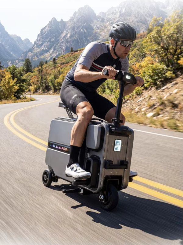 A Person is Riding an Elala Pro Electric Suitcase While Sitting on It