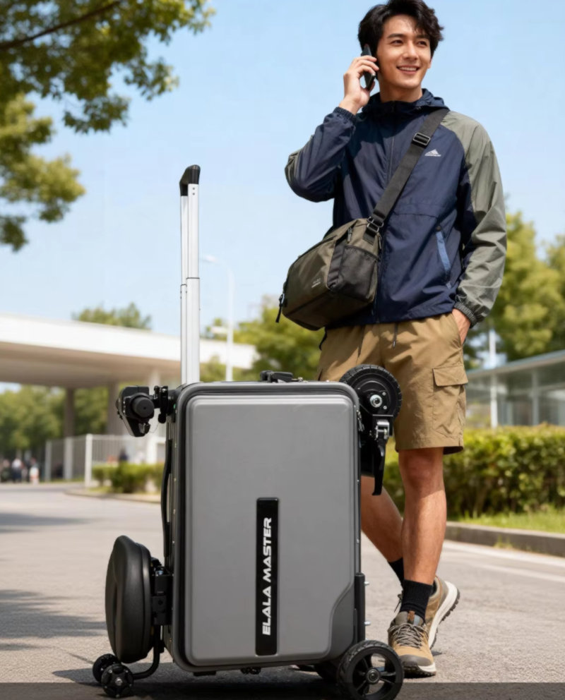 A Person Stands Next to an Elala Master Electric Suitcase