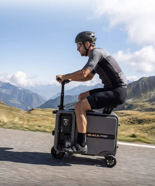A Person is Riding an Elala Pro Electric Suitcase While Sitting on It