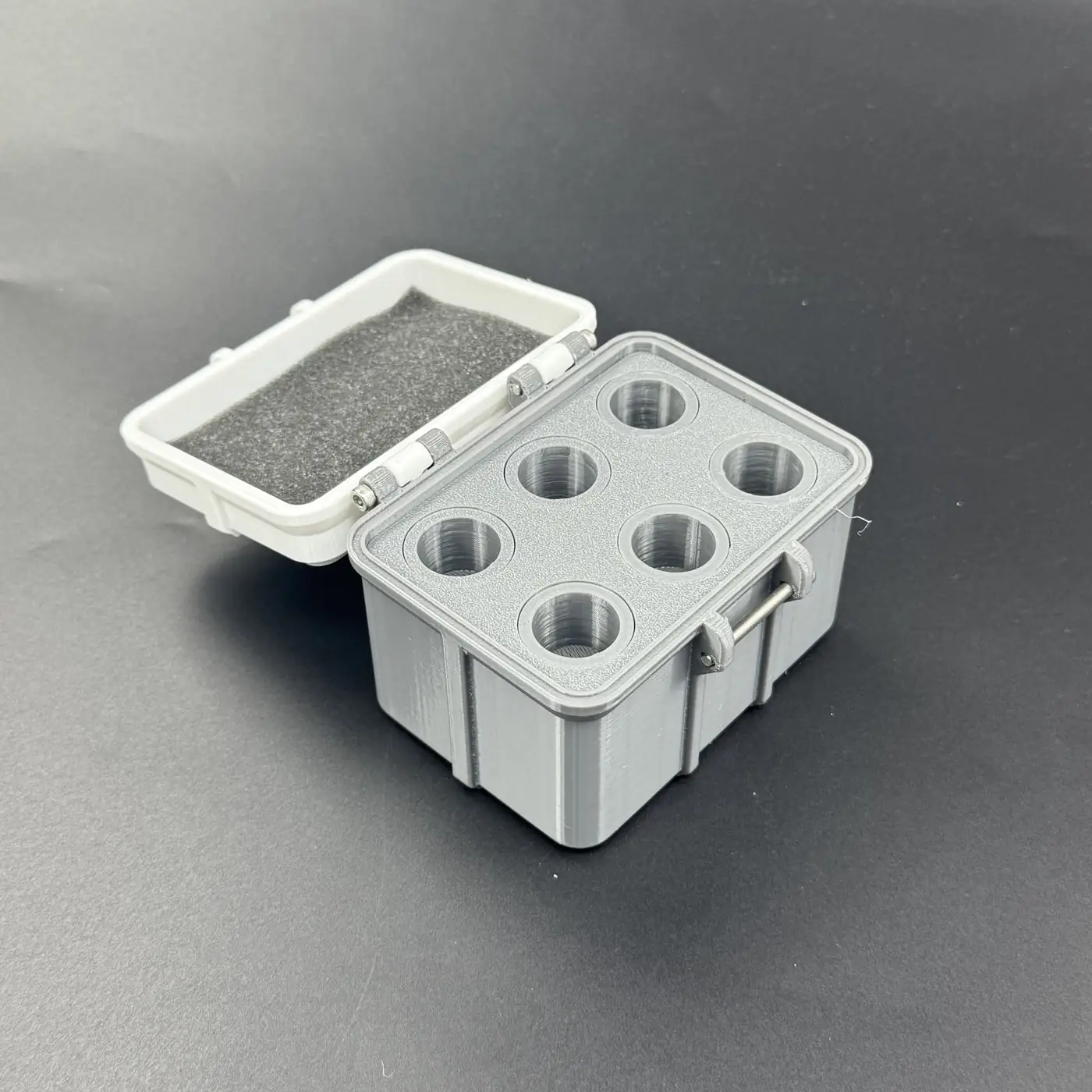 six-bore removable insert of multi-size vial storage box, open lid showing 5 mm foam