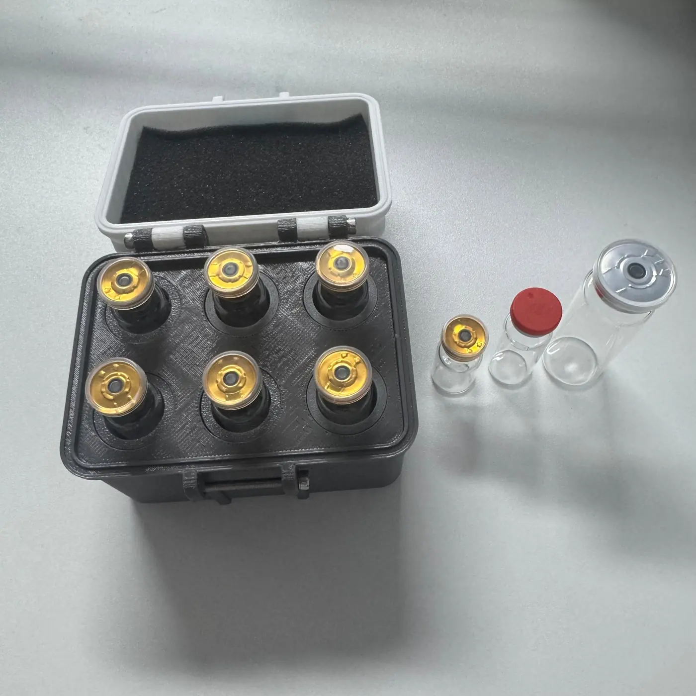 six 2ml vials seated flush in the 16 mm slots