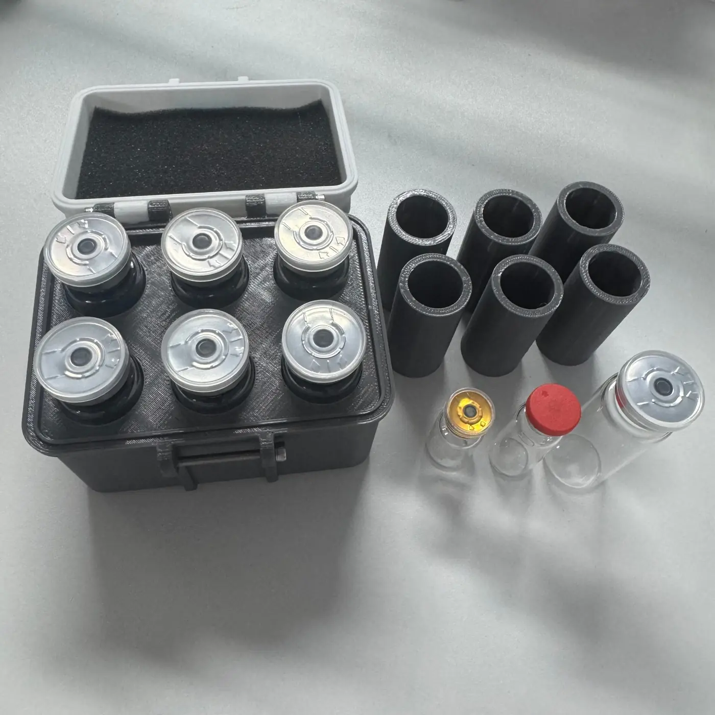 15ml vials seated in the 22 mm bare bores, cavities removed beside